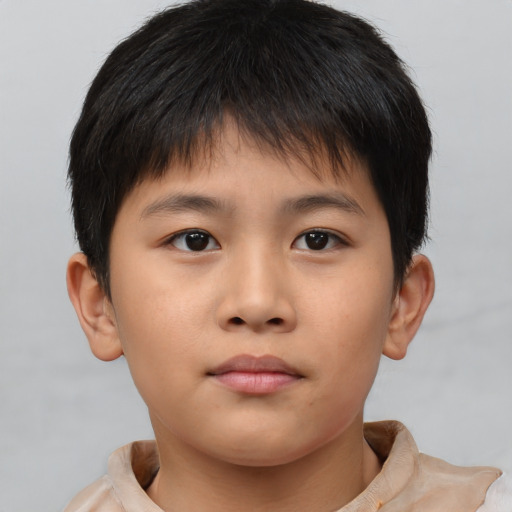 Neutral asian child male with short  brown hair and brown eyes