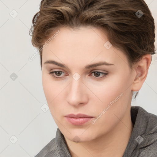 Neutral white young-adult female with short  brown hair and brown eyes