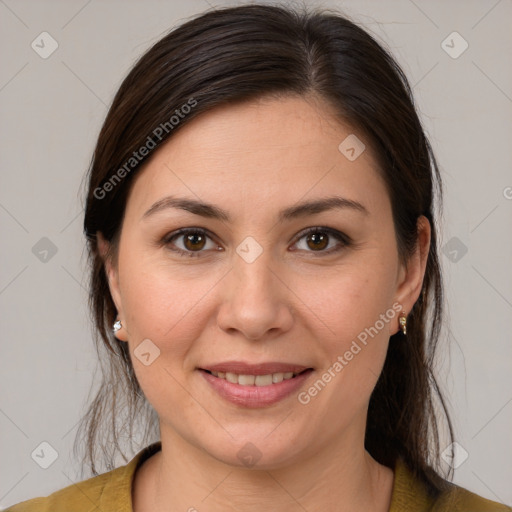 Joyful white young-adult female with medium  brown hair and brown eyes