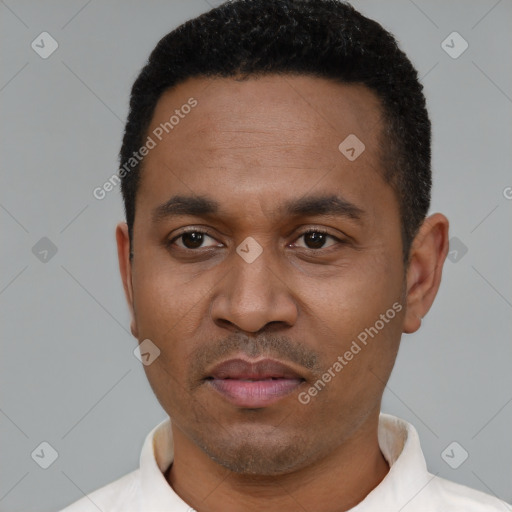 Neutral black young-adult male with short  black hair and brown eyes