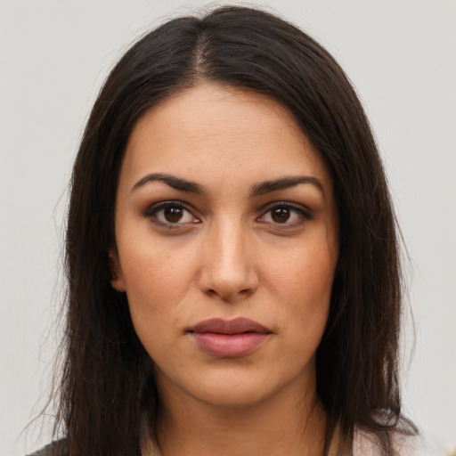 Neutral latino young-adult female with long  brown hair and brown eyes