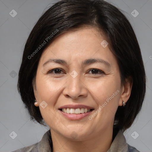 Joyful white adult female with medium  brown hair and brown eyes