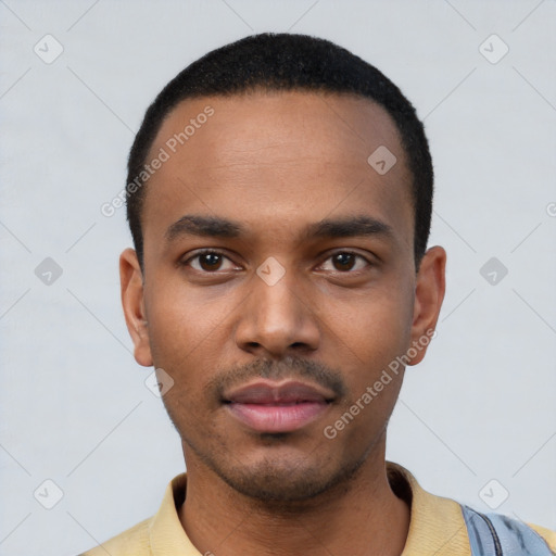 Neutral latino young-adult male with short  black hair and brown eyes