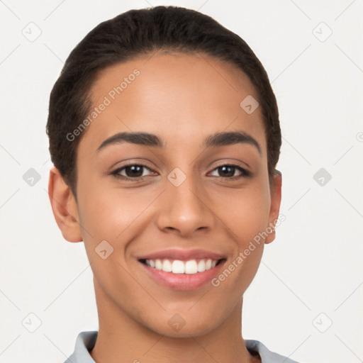 Joyful latino young-adult female with short  brown hair and brown eyes