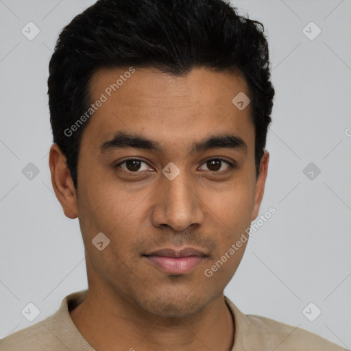 Neutral latino young-adult male with short  black hair and brown eyes