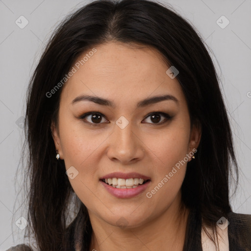 Joyful latino young-adult female with long  brown hair and brown eyes