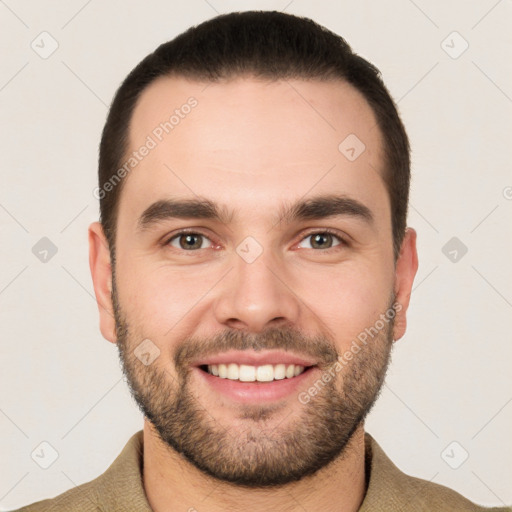 Joyful white young-adult male with short  brown hair and brown eyes