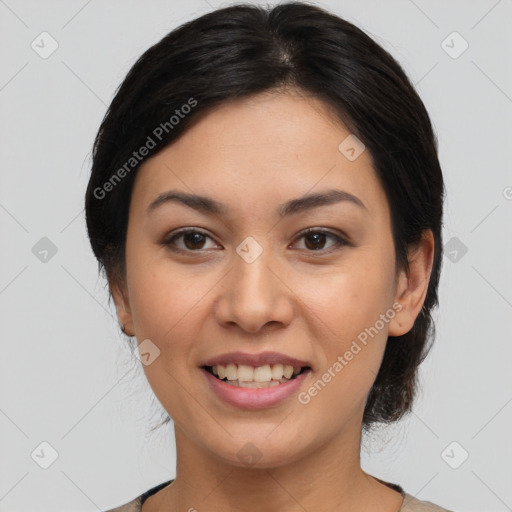 Joyful latino young-adult female with medium  brown hair and brown eyes