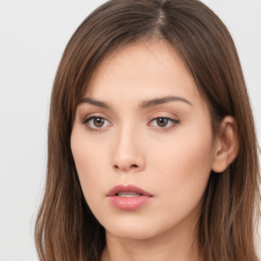 Neutral white young-adult female with long  brown hair and brown eyes