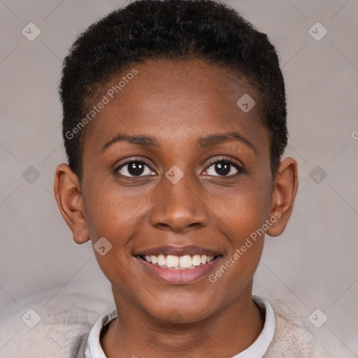 Joyful black young-adult female with short  brown hair and brown eyes