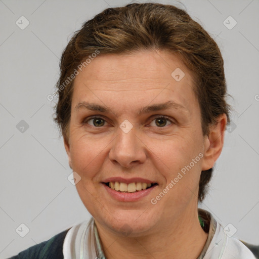 Joyful white adult female with short  brown hair and brown eyes