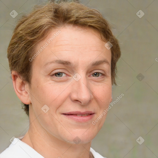 Joyful white adult female with short  brown hair and brown eyes