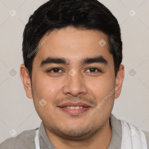 Joyful white young-adult male with short  black hair and brown eyes