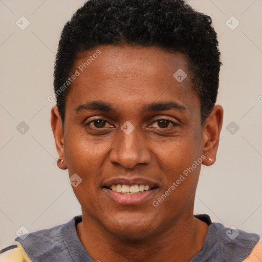 Joyful black young-adult male with short  brown hair and brown eyes