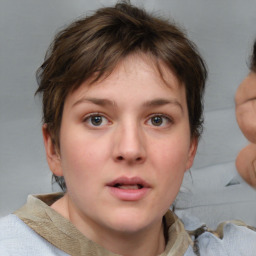 Neutral white young-adult female with short  brown hair and brown eyes