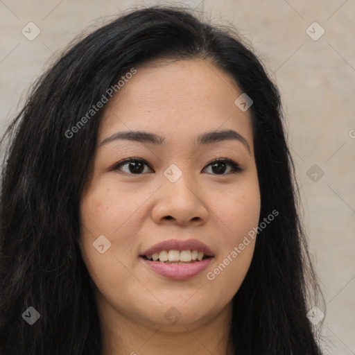 Joyful asian young-adult female with long  brown hair and brown eyes