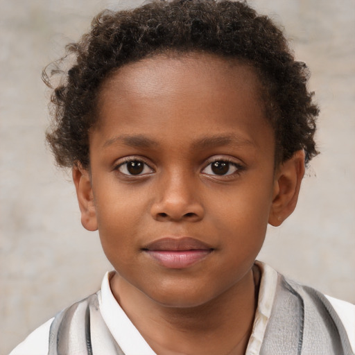 Joyful black child female with short  brown hair and brown eyes