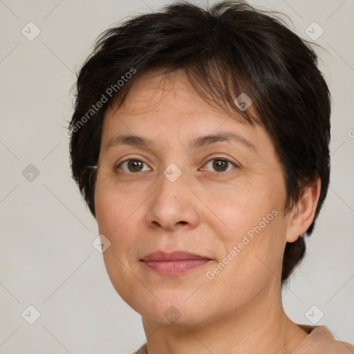 Joyful white adult female with short  brown hair and brown eyes