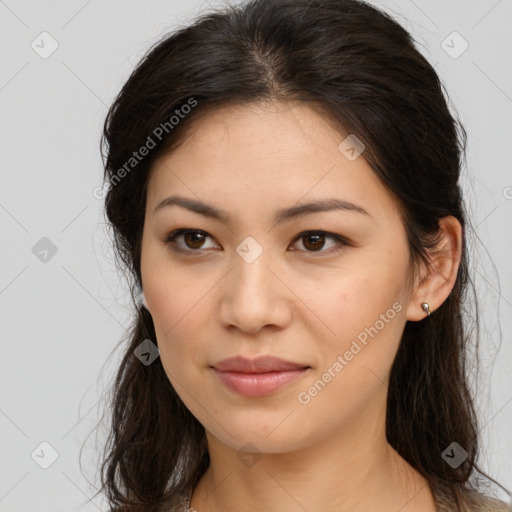 Joyful white young-adult female with long  brown hair and brown eyes