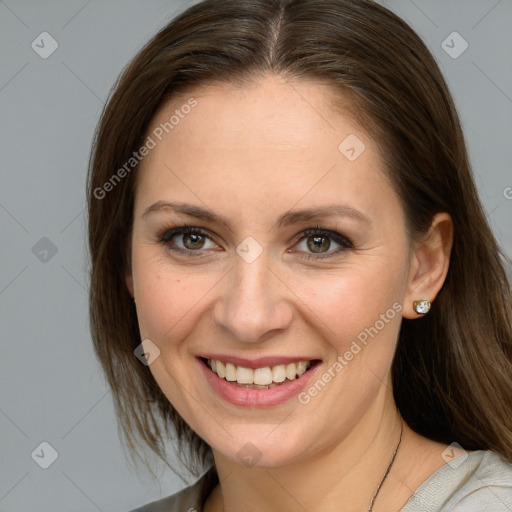 Joyful white young-adult female with medium  brown hair and grey eyes