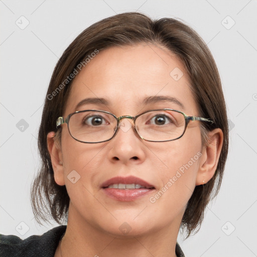 Joyful white adult female with medium  brown hair and grey eyes