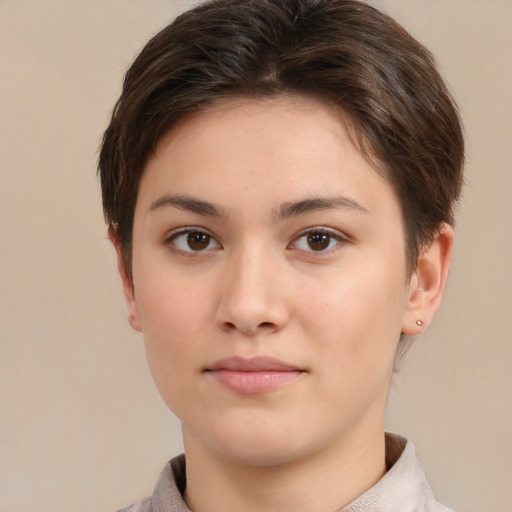 Neutral white young-adult female with short  brown hair and brown eyes