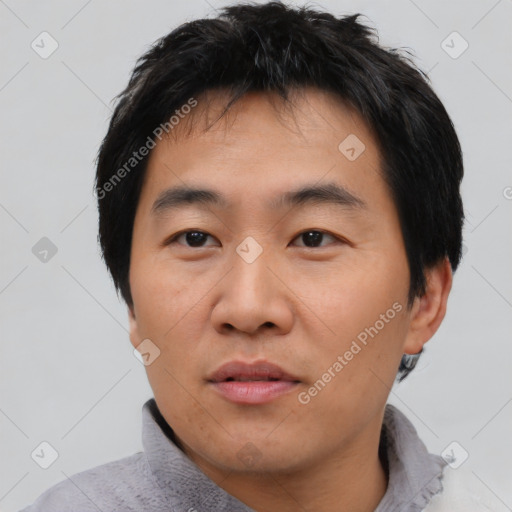 Neutral asian young-adult male with short  black hair and brown eyes