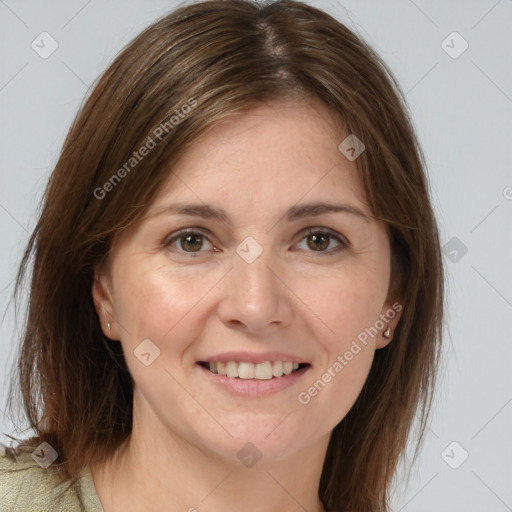 Joyful white adult female with long  brown hair and brown eyes