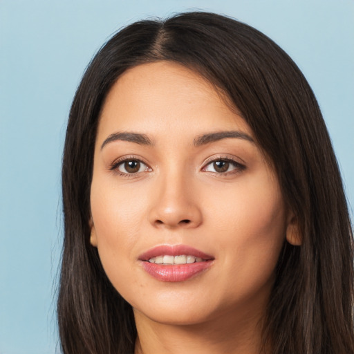 Joyful white young-adult female with long  brown hair and brown eyes