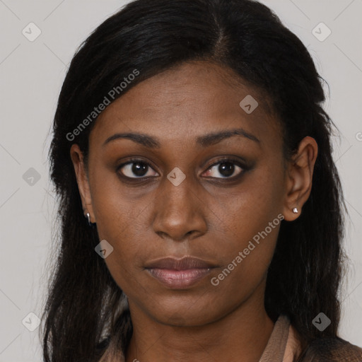 Neutral black young-adult female with long  brown hair and brown eyes