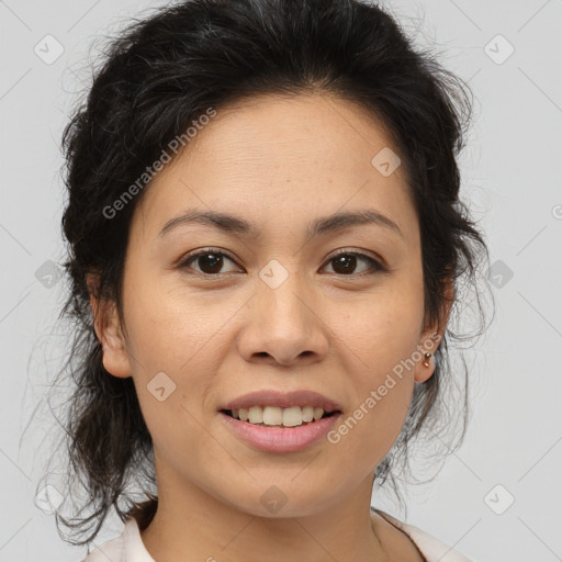 Joyful latino young-adult female with medium  brown hair and brown eyes