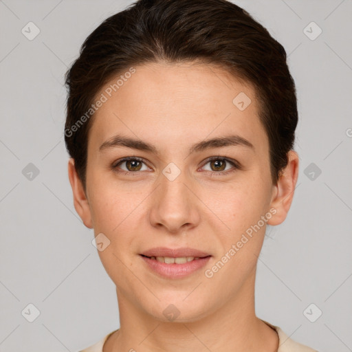 Joyful white young-adult female with short  brown hair and brown eyes