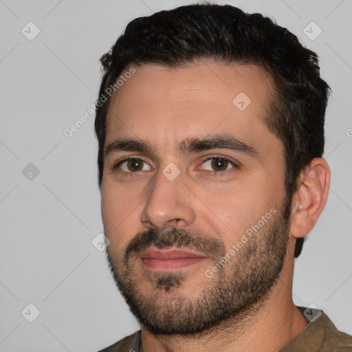 Joyful white young-adult male with short  black hair and brown eyes