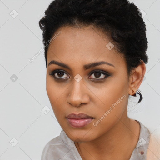 Neutral black young-adult female with short  brown hair and brown eyes