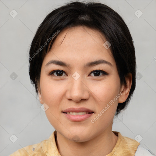 Joyful asian young-adult female with medium  brown hair and brown eyes