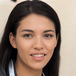 Joyful asian young-adult female with long  brown hair and brown eyes