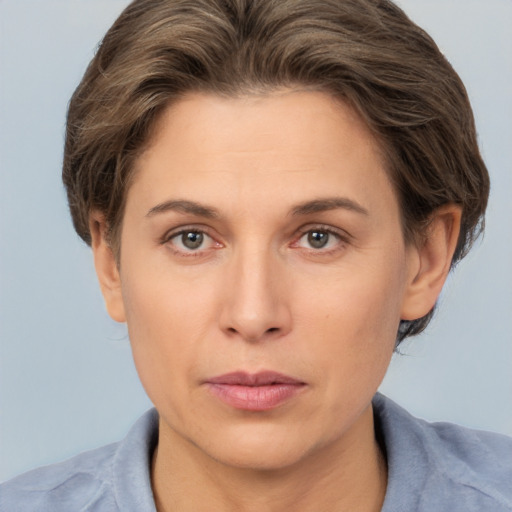 Neutral white young-adult female with short  brown hair and brown eyes