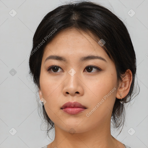 Neutral asian young-adult female with medium  black hair and brown eyes