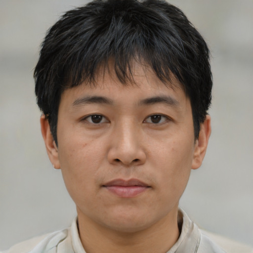 Neutral asian young-adult male with short  brown hair and brown eyes