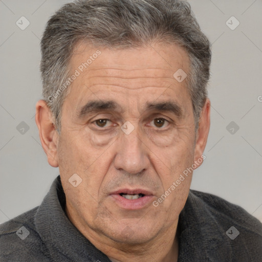 Joyful white middle-aged male with short  brown hair and brown eyes