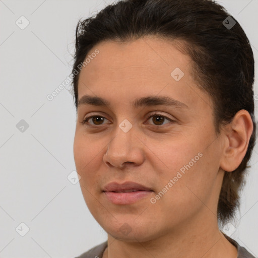 Joyful white young-adult female with short  brown hair and brown eyes