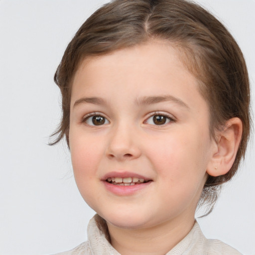 Joyful white child female with medium  brown hair and brown eyes