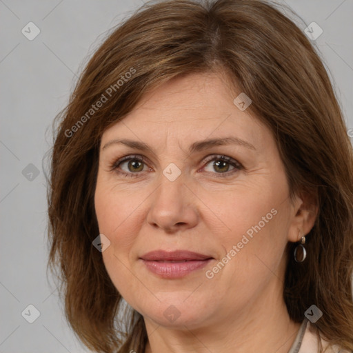 Joyful white adult female with medium  brown hair and brown eyes