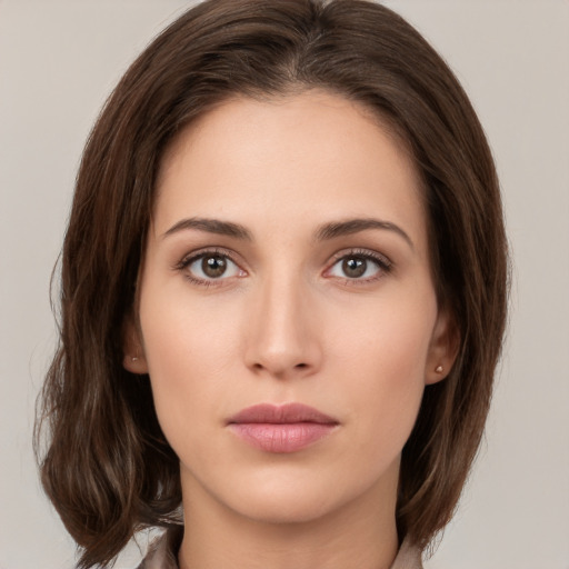 Neutral white young-adult female with medium  brown hair and brown eyes