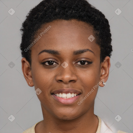 Joyful black young-adult female with short  black hair and brown eyes