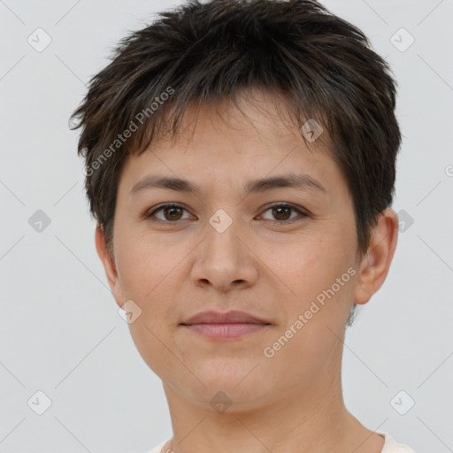 Joyful white young-adult female with short  brown hair and brown eyes