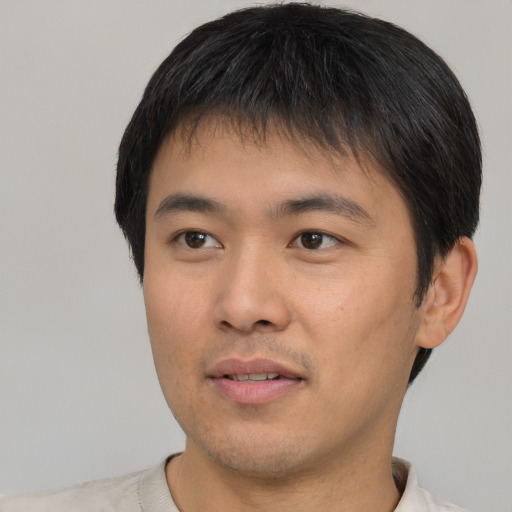 Neutral asian young-adult male with short  black hair and brown eyes