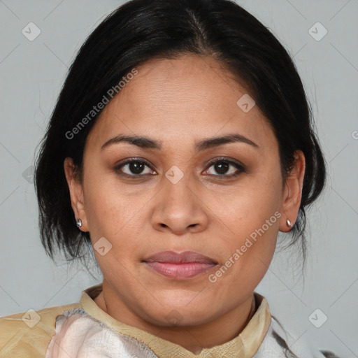 Joyful latino young-adult female with medium  brown hair and brown eyes