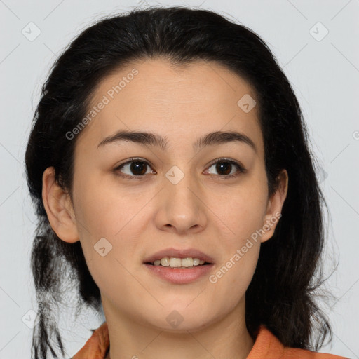 Joyful latino young-adult female with medium  brown hair and brown eyes