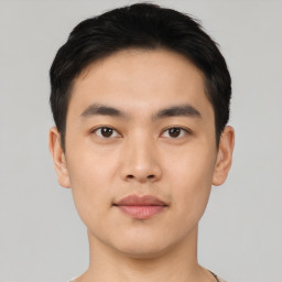 Neutral asian young-adult male with short  black hair and brown eyes